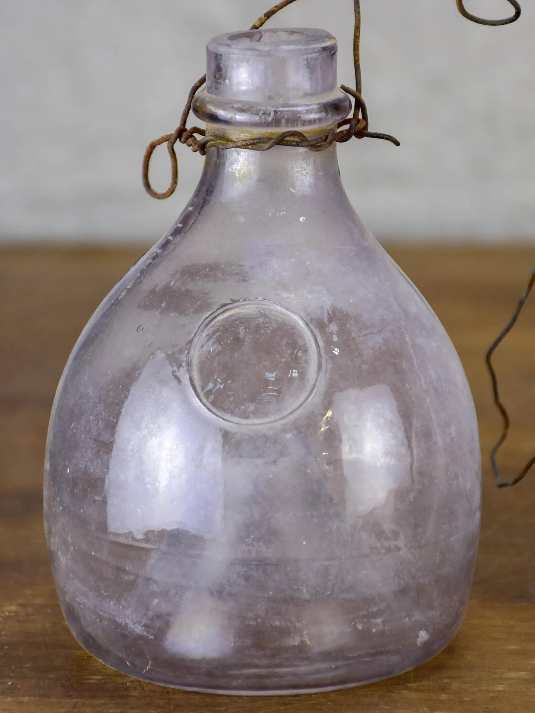 Three antique French fly-trap bottles - purple tinge