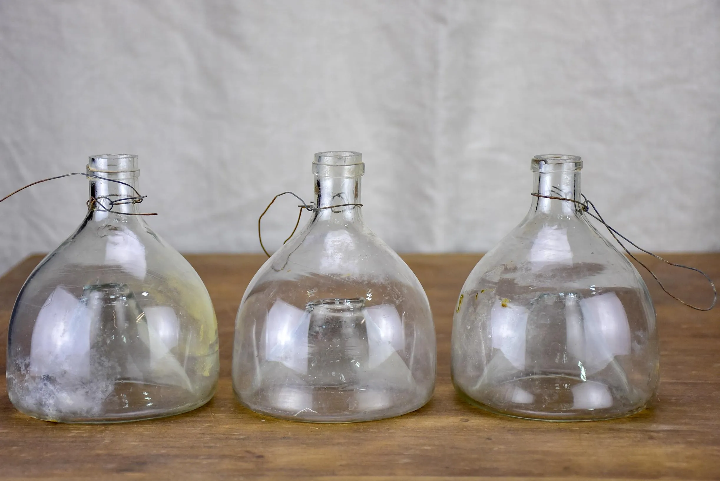 Three antique French fly-trap bottles